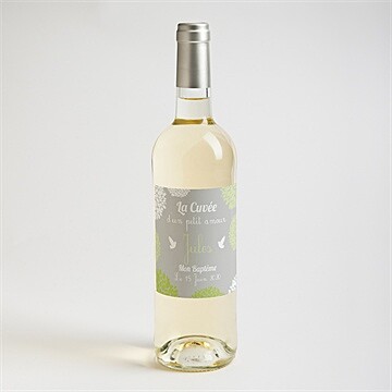 Etiquette de bouteille baptême cadre végétal chic - Mise en situation